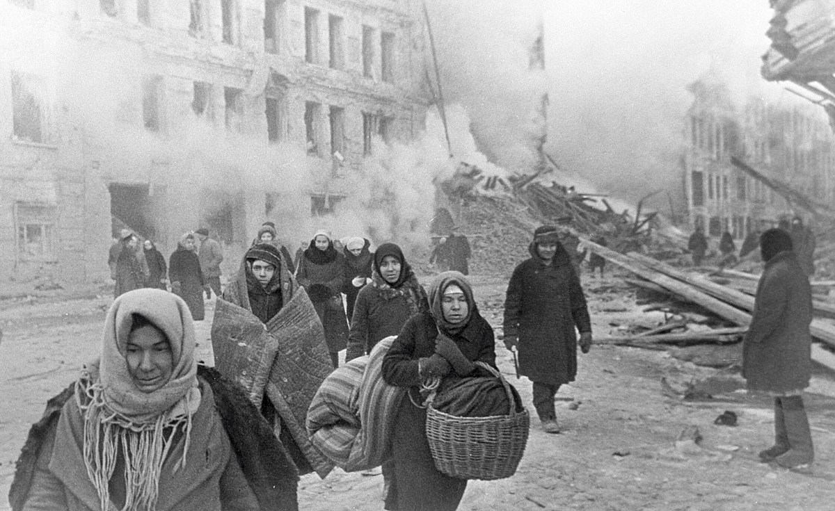 Citizens of Leningrad leaving their houses destroyed by German bombing