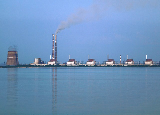  Zaporizhzhia Nuclear Power Plant, the biggest nuclear power station in Europe, consisting of two cooling towers at the left and 6 VVER reactor buildings. File licensed CCA-SA 3.0 Unported